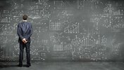 depositphotos_13469724-stock-photo-business-person-against-the-blackboard-transformed.jpeg